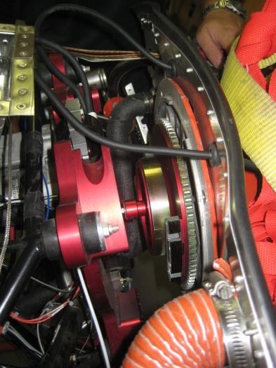 Engine separated from backing plate.