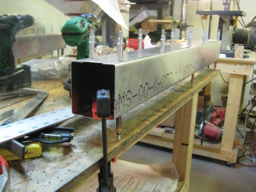 Working on cap strip #2, with ass'y clamped LIGHTLY to table.