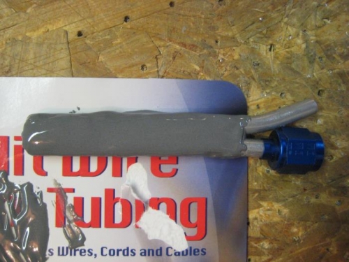 Yet another layer of JB Weld on the fuel tank vent