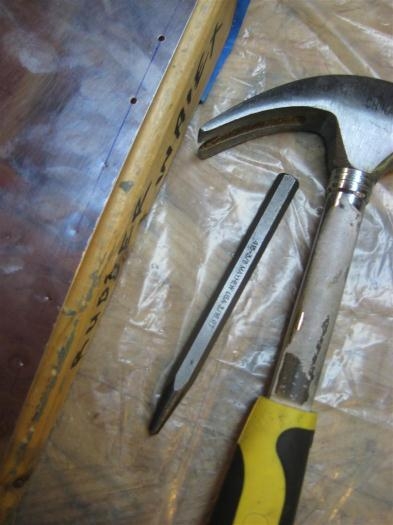 Using a shaped block to back up the punch and the drill