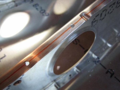 Typical holes drilled on centerline of ribs