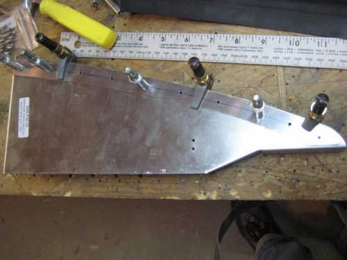 Strap cut, pilot holes drilled through both pieces.