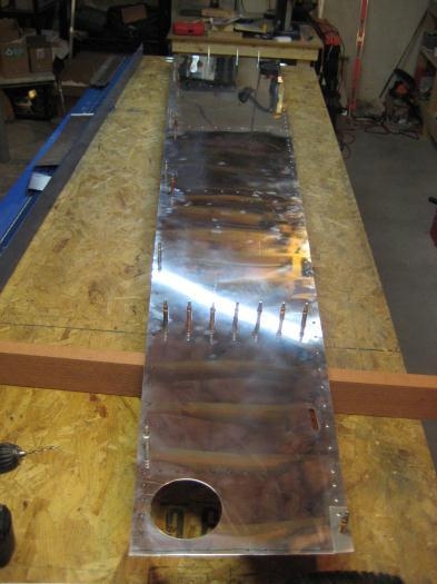 Skin with most rivets (called for at this point) done.