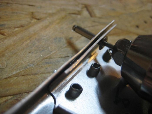 Rivet ends make getting the rivet gun in there,  impossible.