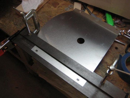 Using my small brake to bend the sides of the lower baffle that holds the oil cooler.