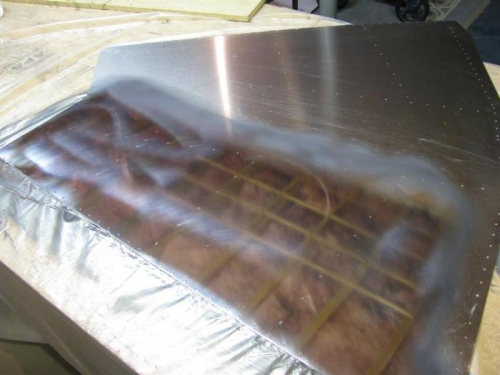 Another shot with the ceiling joists above, and the unpolished area beyond