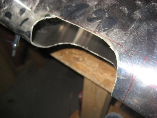 After rough cutting with my Dremel tool with a metal cutoff wheel.