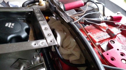 Paper towel to keep metal out of the back of the engine