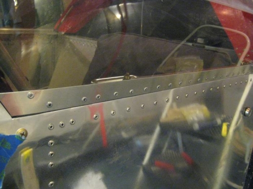 Pilot-side canopy riveted.