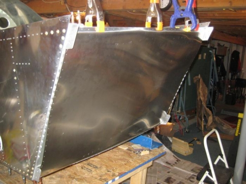 Firewall loosely held in place.