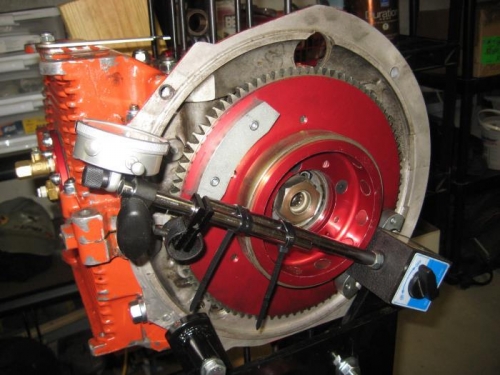 Magnetized base at right, stuck to flywheel magnet.