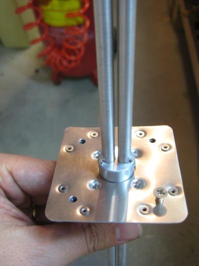 The flip side. The plate will be inside the wing. The round collar is all that will go thru the wing.