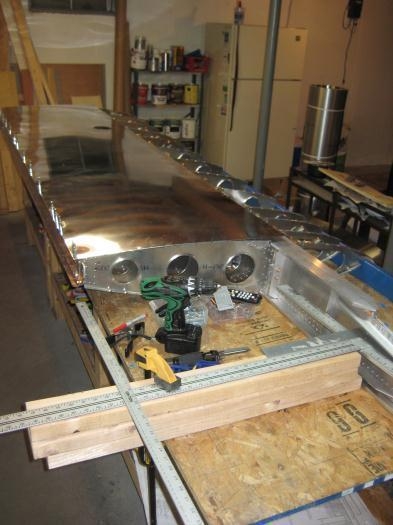 Setting the proper distance from the wing spar station point.