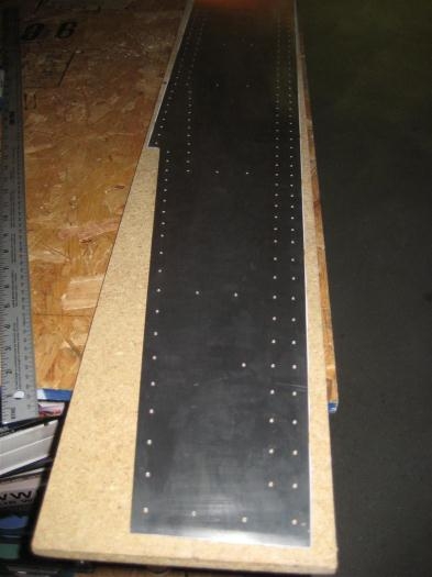 Web with holes drilled