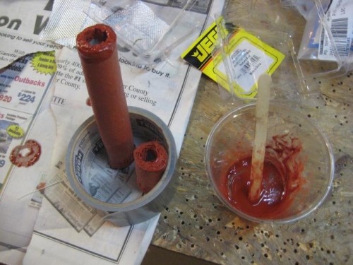 Red RTV in mineral spirits, to seal the exposed ends of the fire sleeve. Needs to dry overnight.