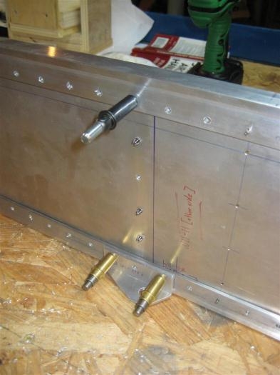 The wing tie-down assembly drilled