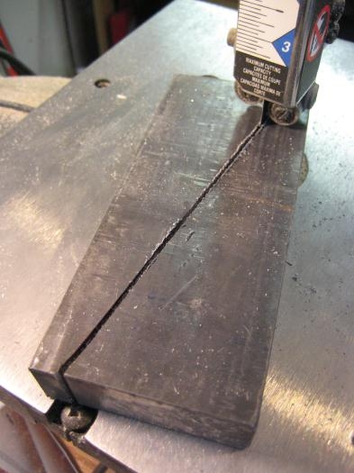 Cutting the lead counterweights with the band saw