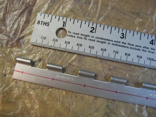 Marking elevator hing halves for drilling