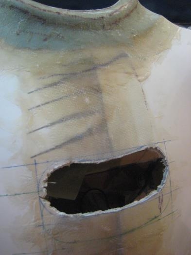 Oil cooler inlet rough cut with the Dremel.