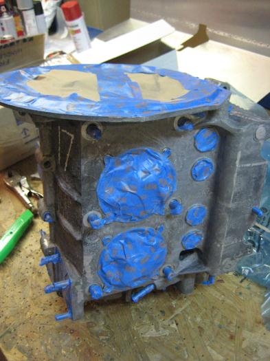 Case mated. Covering all surfaces and holes in preparation for painting.