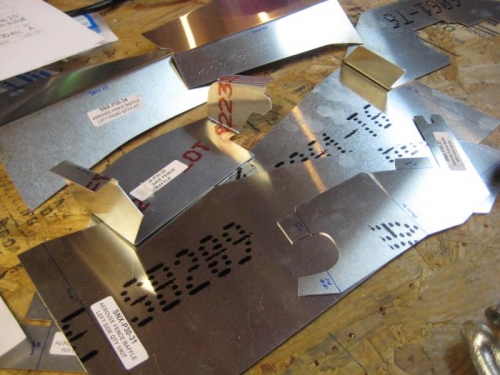 Half way through bending the baffle pieces.