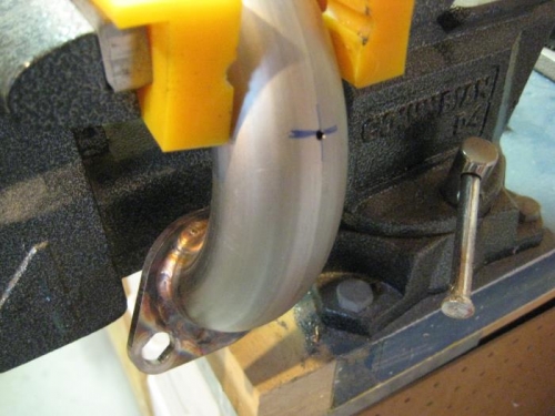 Pilot hole in exhaust for EGT probe.