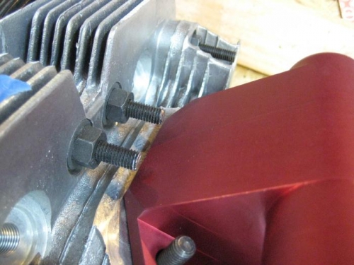 Yes, I have the intake on the wrong side, but either way the studs stick WAY out and need to be cut.