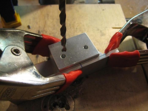 The setup of the clamps allowed the angle to lie flat and square