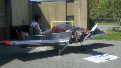 At the airport, and wings installed!