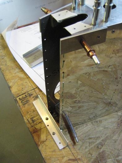 Tail end against angle stop to set spacing of side skins