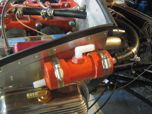 Mounted on the left baffle.