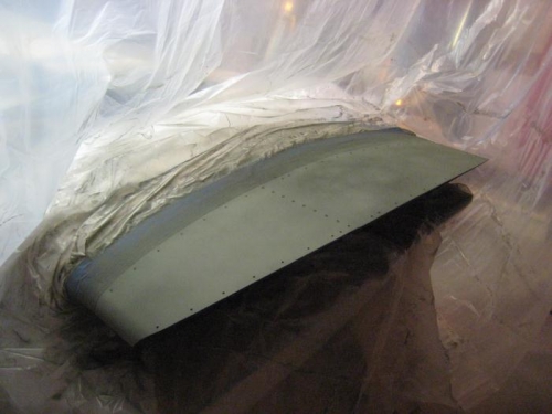 Left wing tip primed