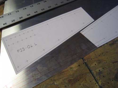 Making the F23-06 seat belt anchor points with (partial) paper patterns.