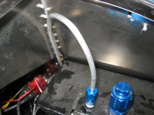 Vent tube secured to smoke tank.