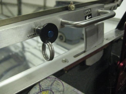 Pin holds canopy in the partial open position...