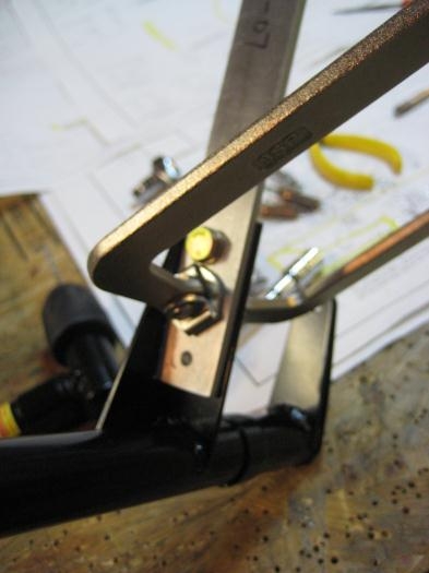 Drilling the two holes for the flap handle.