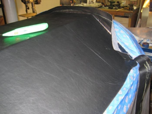 Cut the fabric at the intersection of the glare shield & firewall.