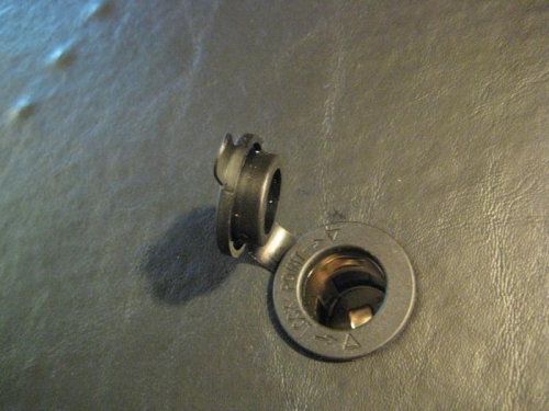 Accessory outlet installed. Note cap that is part of marine-grade outlet.