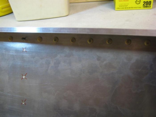 Rivets driven without rivet tape