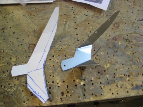 Pattern on left, cut and bent part on the right.