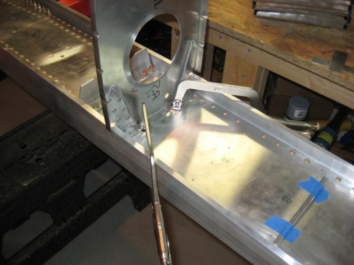 Rib centered and clamped in place over saw horses.