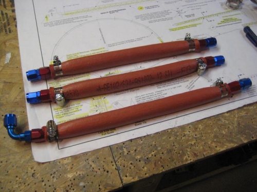 Fire sleeve on fuel and oil cooler lines.