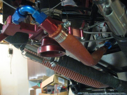 Fuel line in place from carb to fuel strainer.