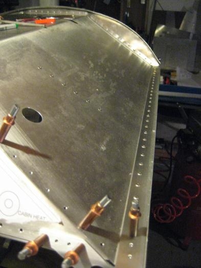 Riveted the glare shield in place