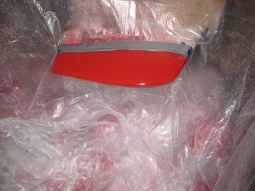 Right tail tip repaired and clear coated.