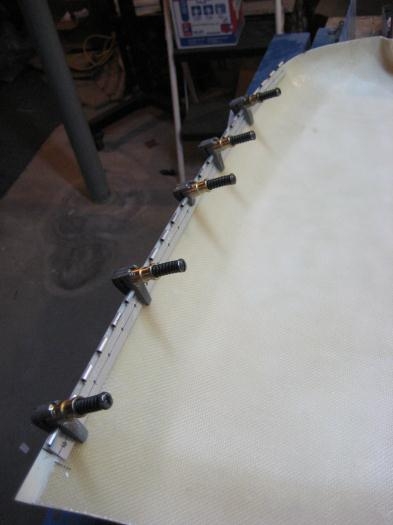 1st hinge half clamped in place on the lower cowl.