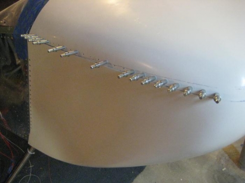 Lower cowl installed, and upper cowl laid on top, ready for shop light behind.