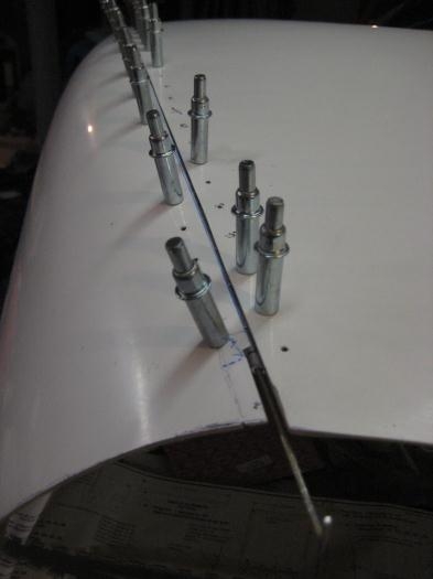 View from the back end of the two cowl halves showing the pin partly pulled out.