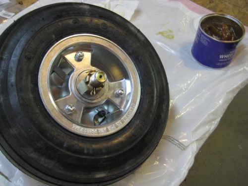 Wheel bearings greased, and wheels/brakes installed.