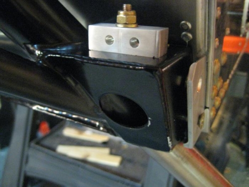 Block for brake cables, secured to the engine mount.